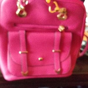 It's a pink bookbag purse
